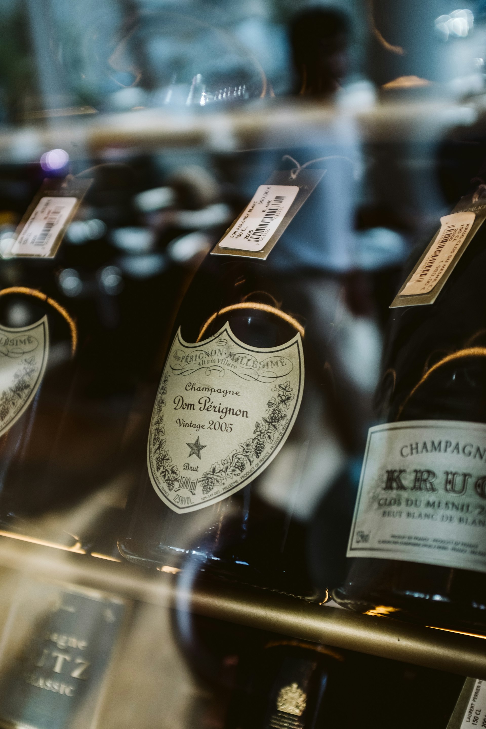 Dom Pérignon bottles resting in a case